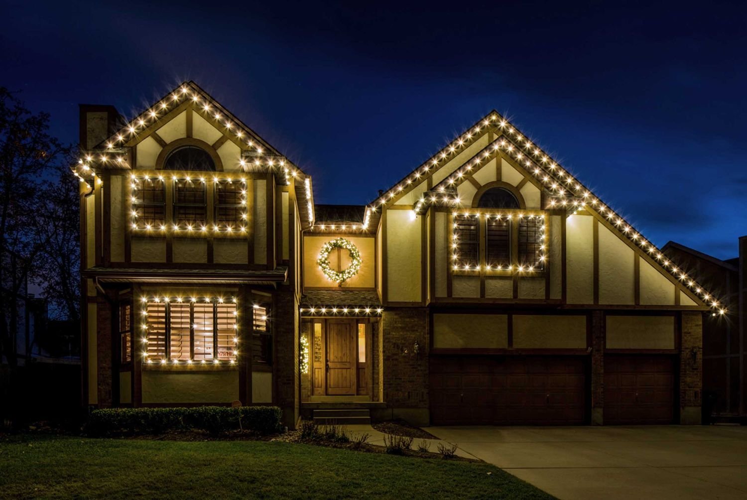 Christmas roof peaks and window lights installed by The Light Guys in Bakersfield